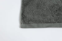 Gray bath mat on a white background