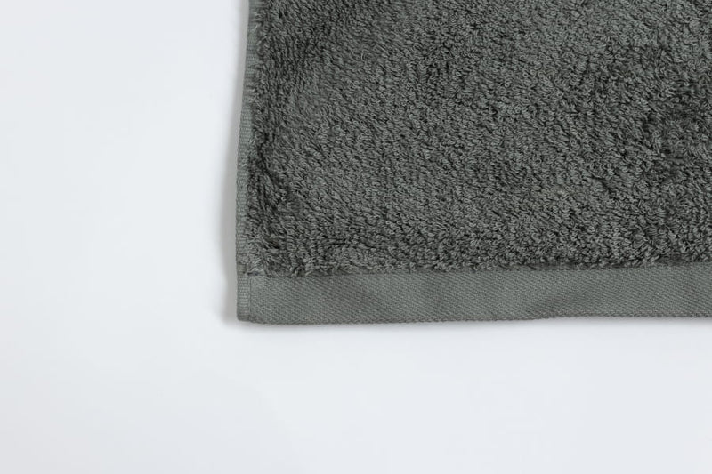 Gray bath mat on a white background